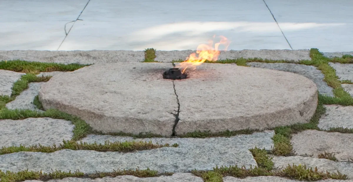 The eternal flame at the grave of John F. Kennedy in Arlington National Cemetery, a tram stop on a Washington DC tour for seniors